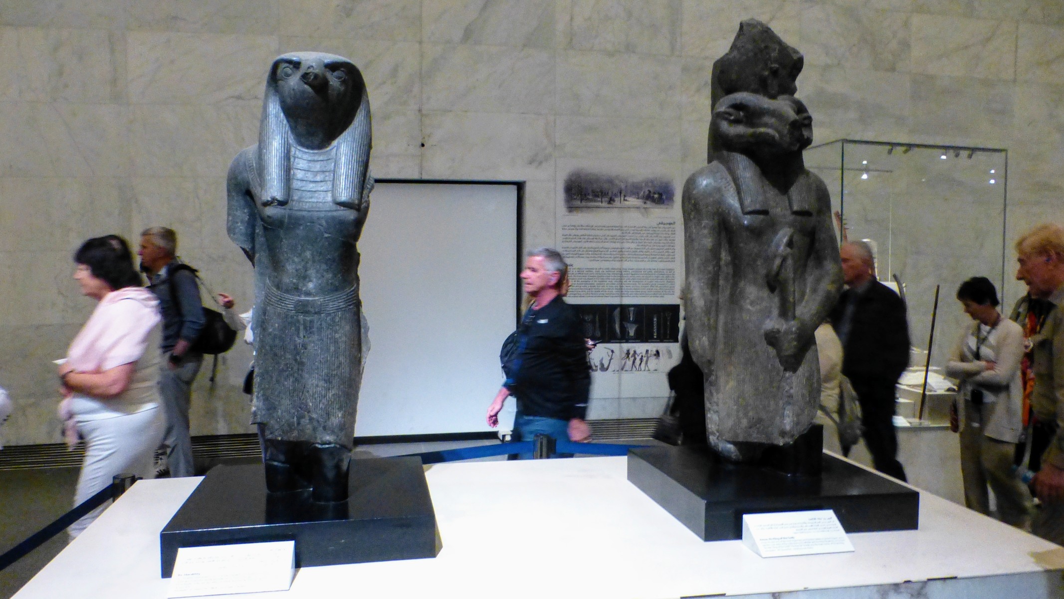 Statues of Horus and Khnum. (I think the one in the middle is mortal.)