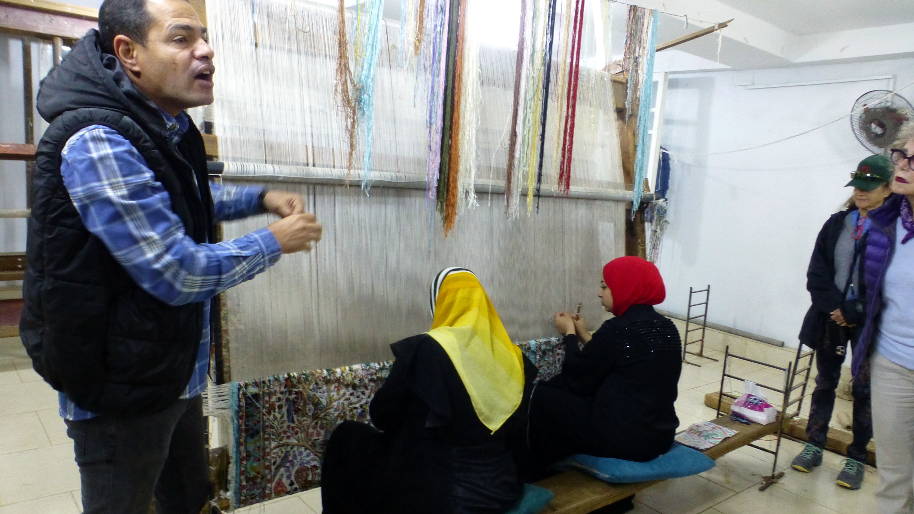 On our way to Giza we made a stop at the Akhnaton Carper School to learn how Egyptian carpets are made. Here we see two young ladies tying the intricate knots that make up a carpet. These types of intricate patterns cannot be made on a loom. Upstairs they had a hugh selection of carpets for sale. One that measured probably 30X54 was priced at $8000.