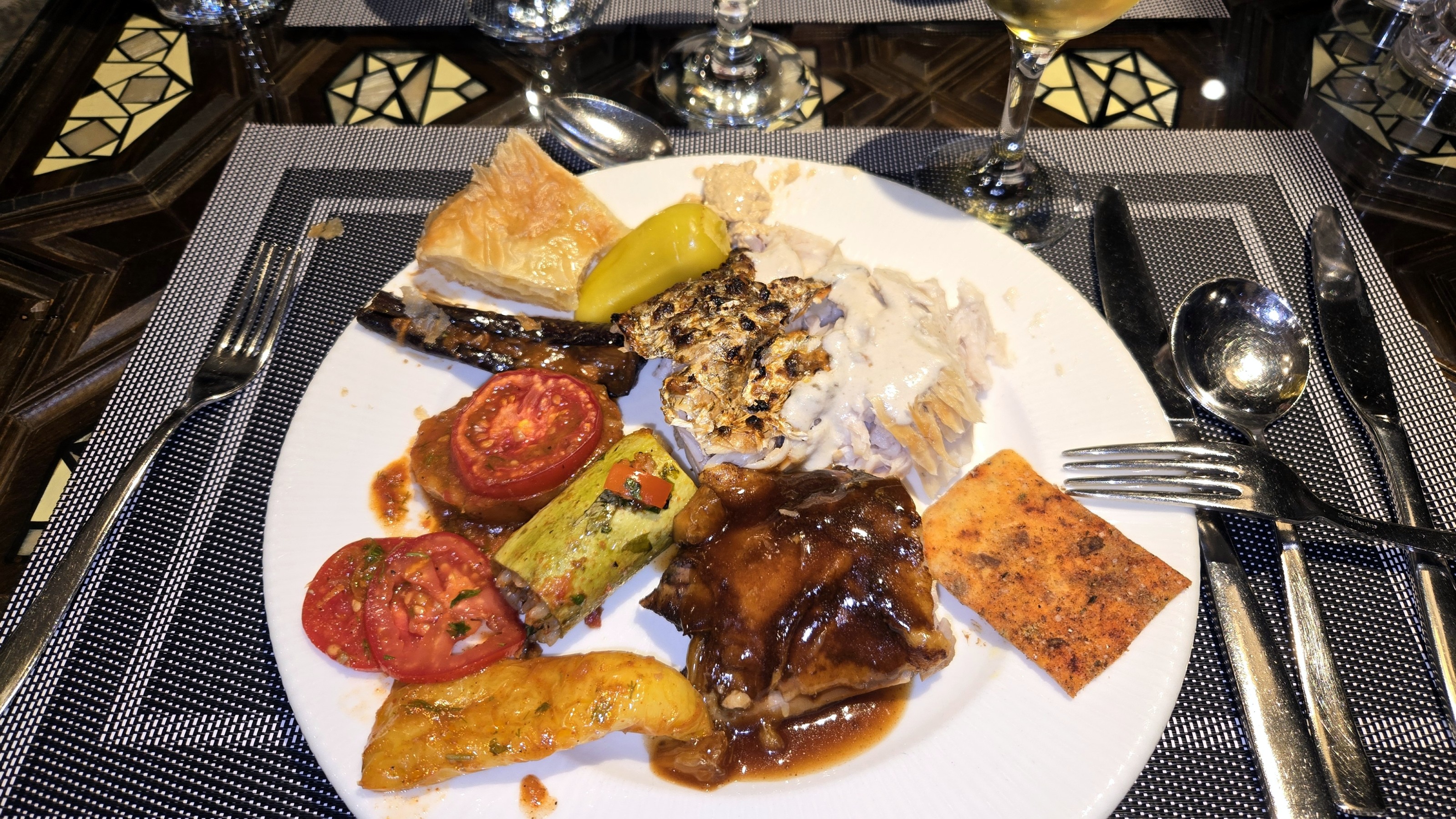 Probably one of the best dishes I had on the entire trip was this beef and mushroom pie. It was accompanied by some tomatoes in balsamic, stuffed egg plant, stuffed pepper, stuffed zuchinni, phyllo pastry, a seasoned cracker and I'm not sure what is at the top of the plate. What looks like a small banana pepper was quite hot. I ate at least one every meal (except breakfast).