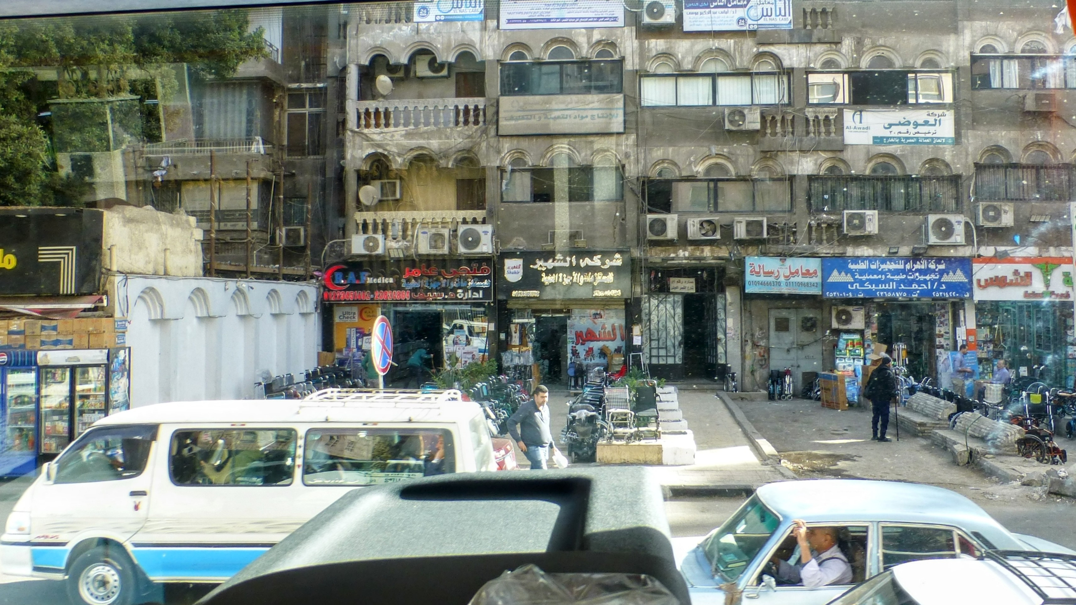 This is an example of a typical commercial strip. Note that all of the apartments above street level have split unit AC rather than window units. I did not see a window unit the entire day (and I looked for them).