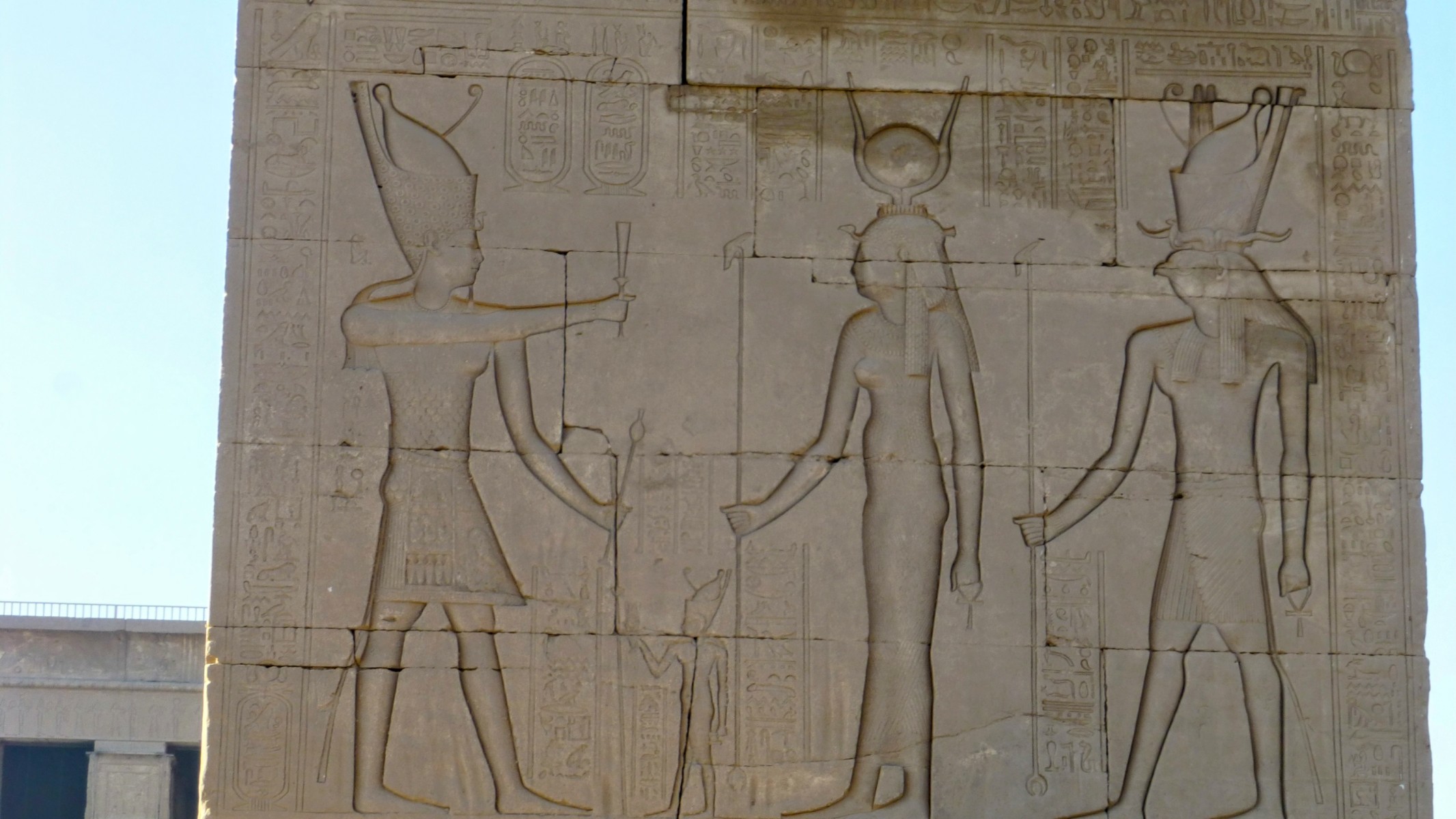 Here the Emperor Trajan receives the Ankh from the Goddess Hathor accompanied by her husband, Horus.