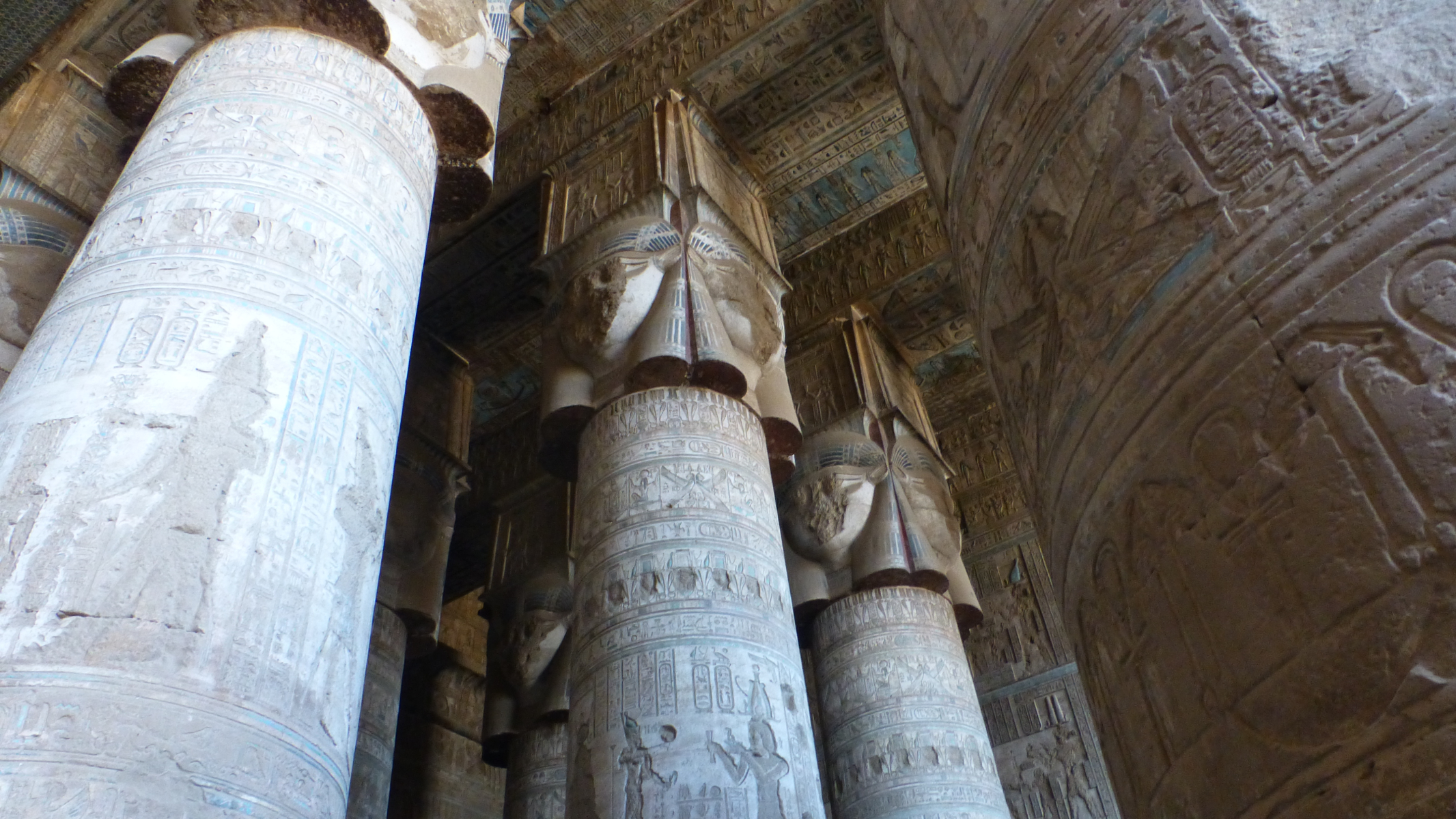 Now inside the temple we see some of the many painted carvings. Click on the picture and zoom and pan to the top of he column and the ceiling. None of the carvings in the temple have been restored. This is merely the result of carefully cleaning the paintings.