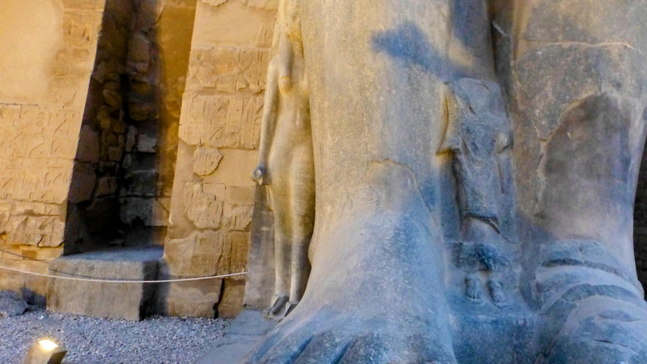 Partially hidden by Ramses' stature is his daughter, Merit-Amon.