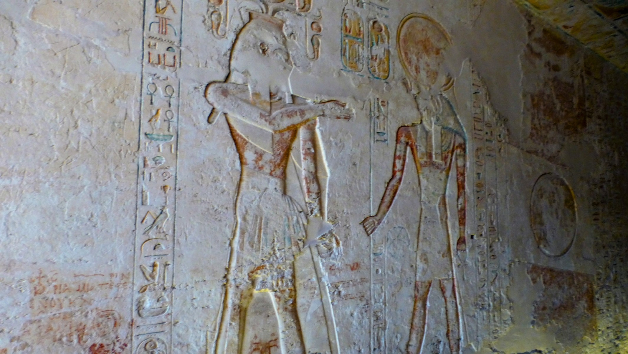 As we enter the tomb of Ramses IV, on the immediate left we see the King receiving the Ankh from the goddess Hathor.