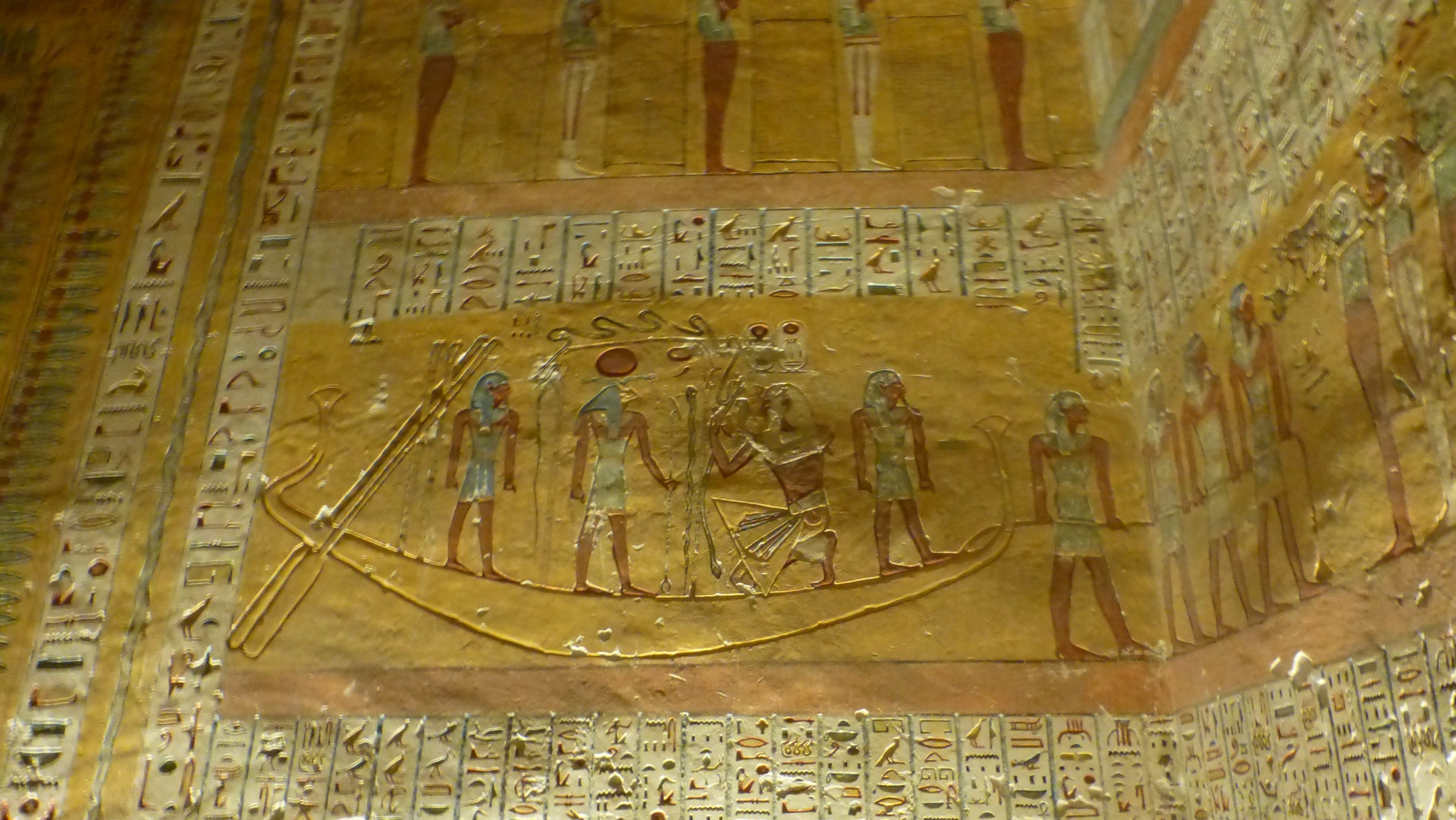 The King with his god and goddess buddies sailing on his solar boat to the afterlife.
