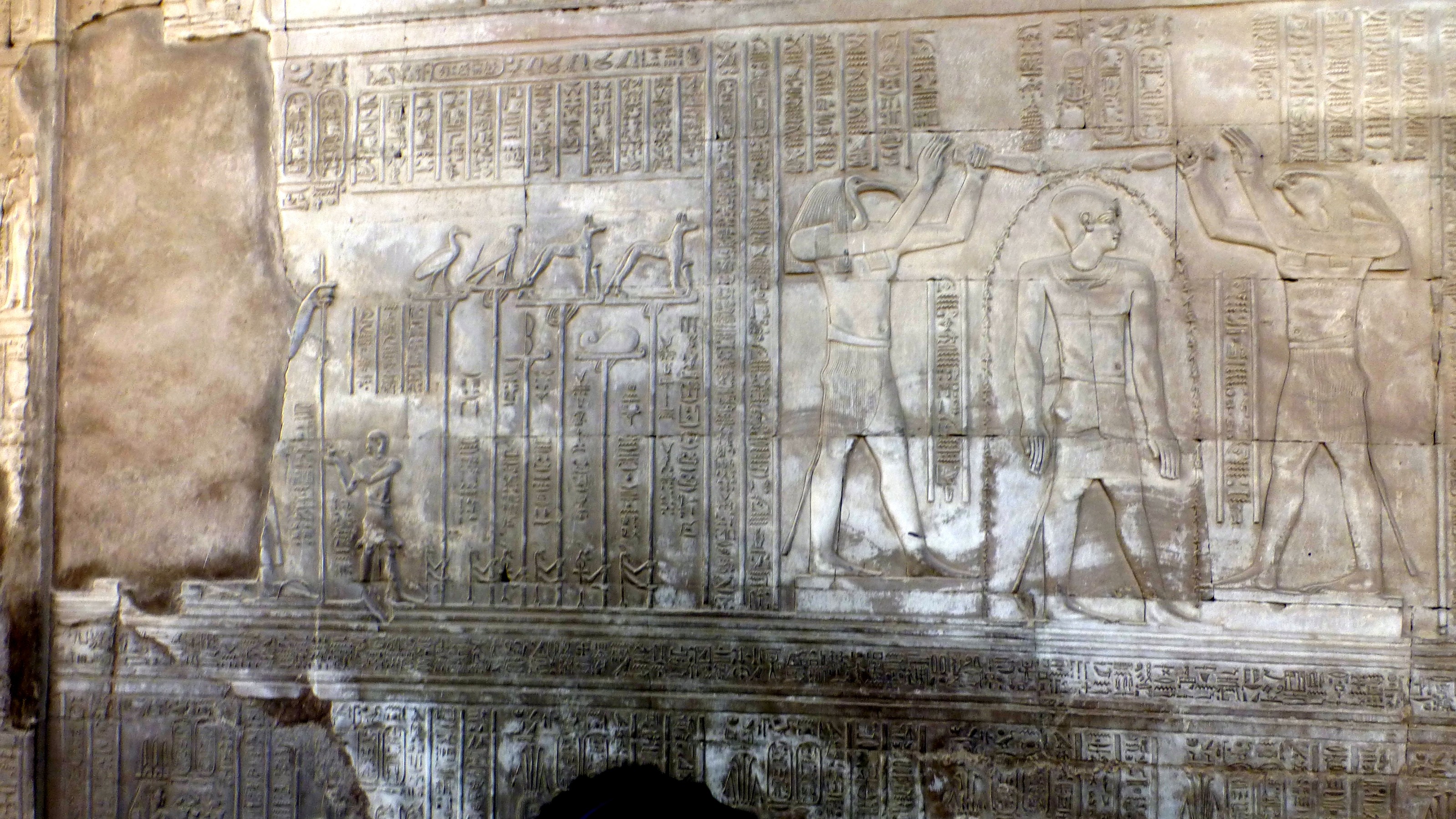 This depicts Ptolemy VII receiving incense from Horus and Toth.