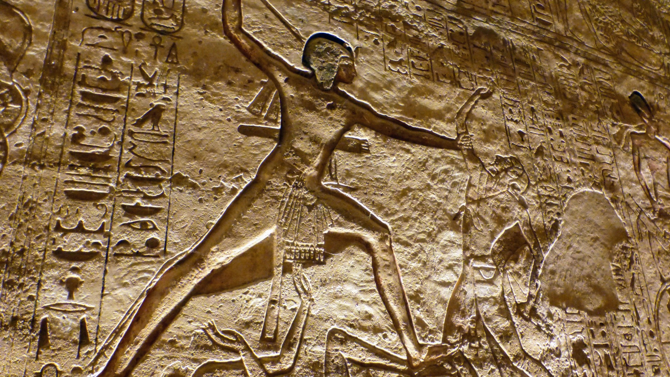 Ramses II killing his enemies with his spear.