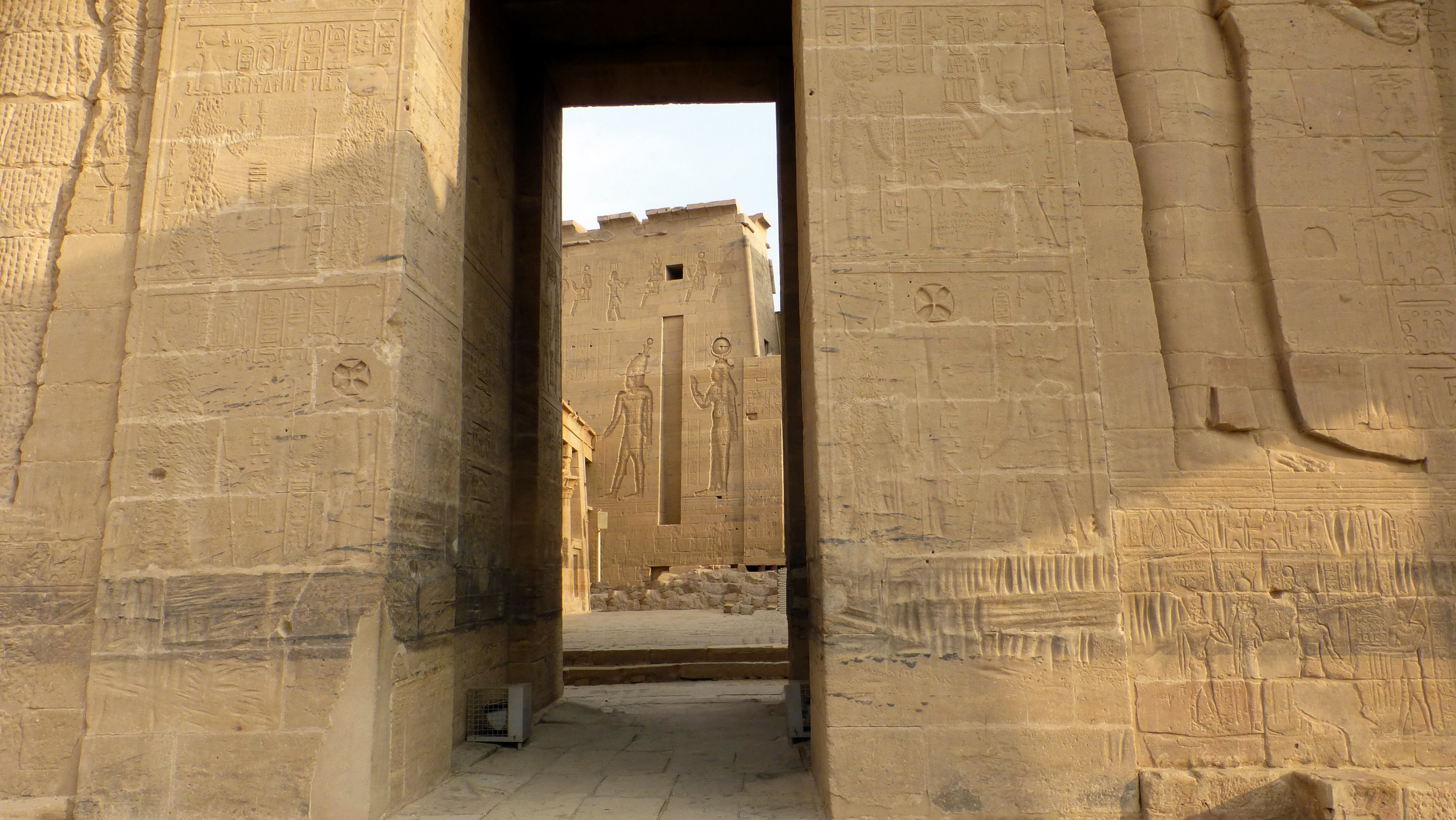 About halfway up the entrance are two Maltese crosses. Click on the photo and zoom with the scroll wheel and pan with the mouse.