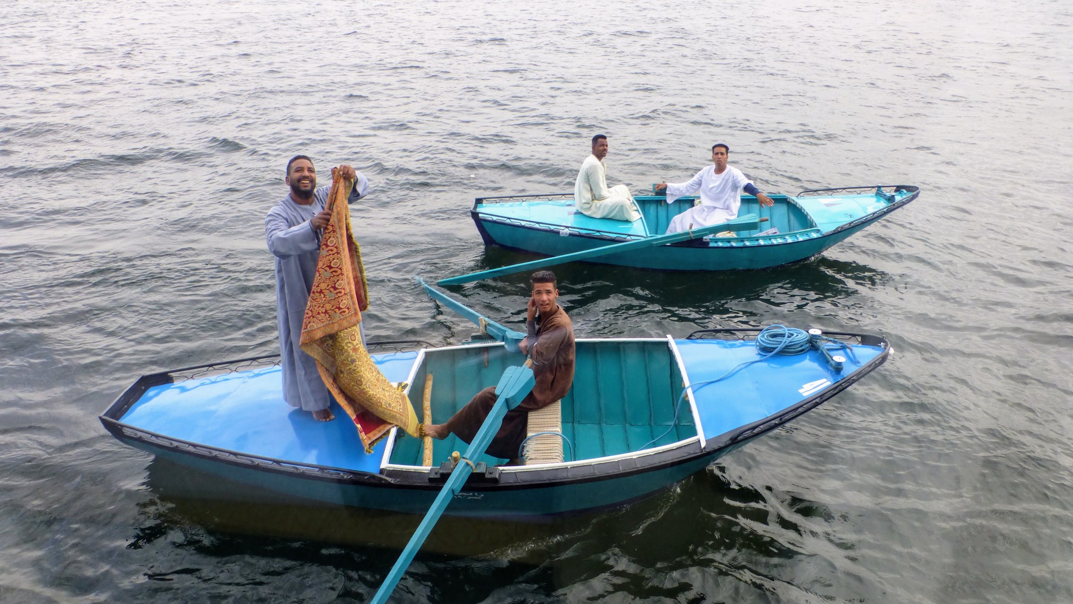 After returning to the boat, I looked out of my window to find these vendors.