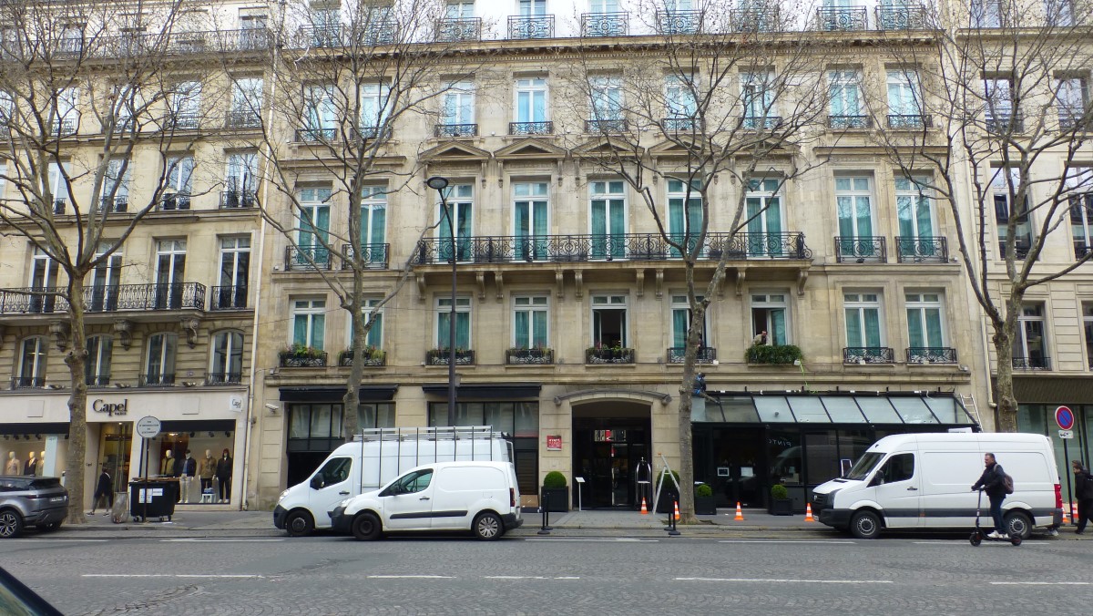 The Hyatt Paris Madeline from across the boulevard. (Note the scooter on the right. They were ubiquitous, often travelling with the street traffic at the same speed!)