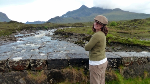 Amy outside the Sligachan with the Black Cullins in the distance.