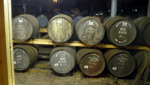 Barrels of fine Whisky aging in the Talisker stonehouse