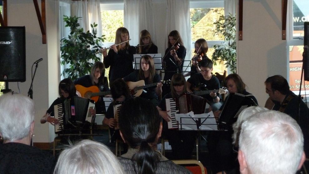 Being serenaded by the Sir E Scott School Ceilidh Band