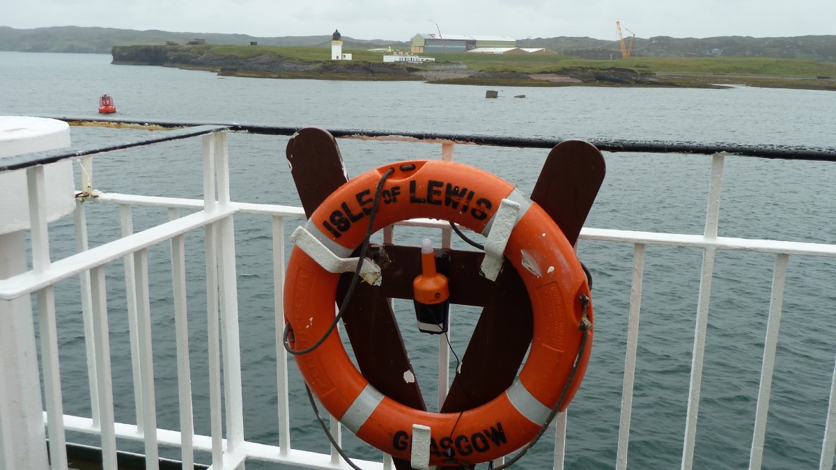 Leaving Stornaway with the Arnish Light from the deck of the Isle of Lewis.