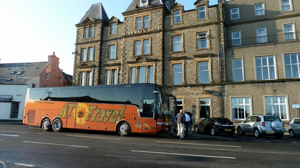 Our Luxury Coach loads in front of the Kirkwall Hotel