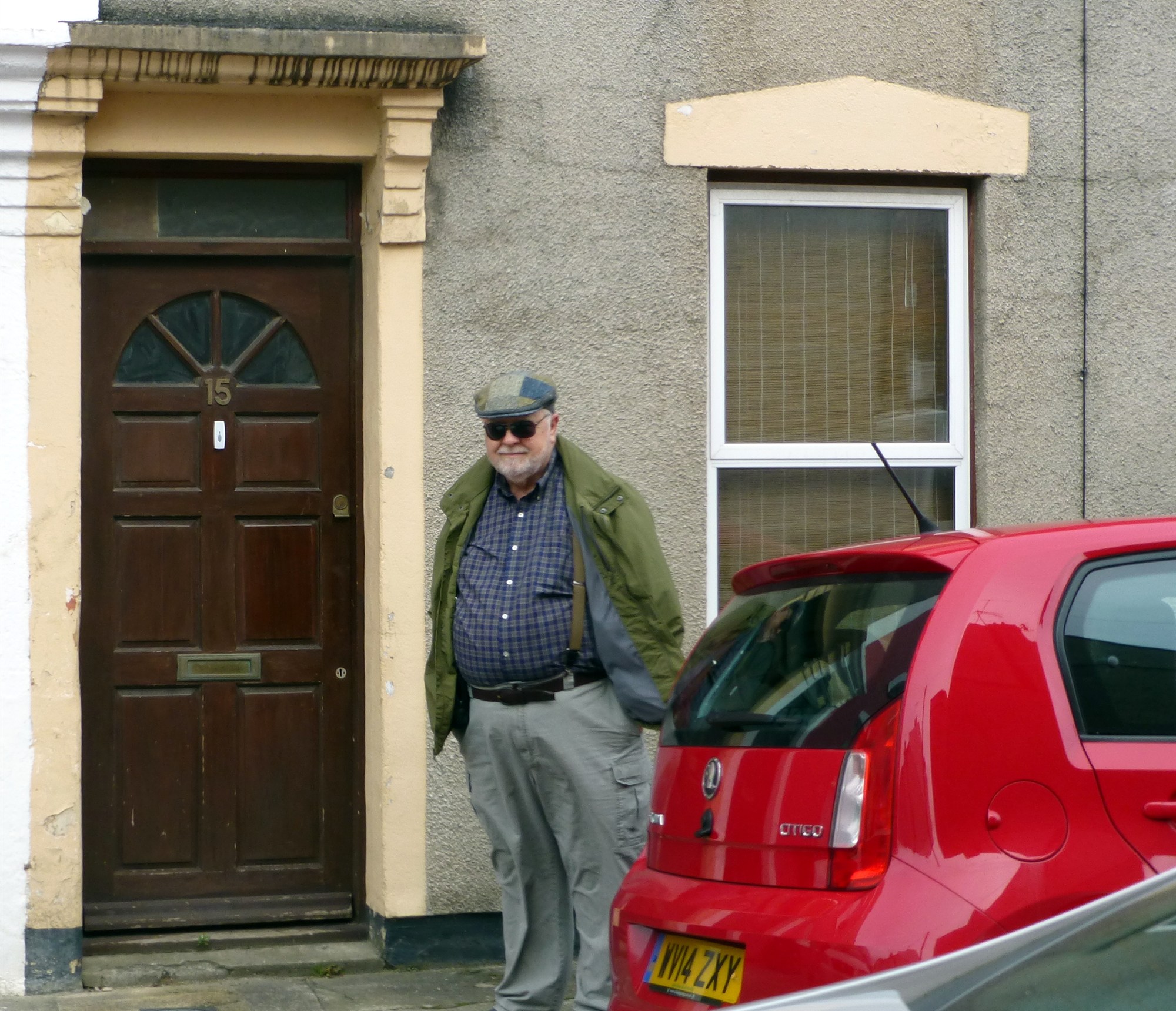Standing at 15 Wells St, AM's  residence in 1910.
