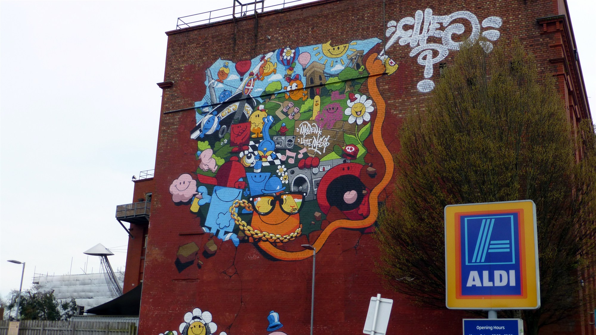 A mural on the side of a building on North St. Oh yeah, and the Aldi's sign.