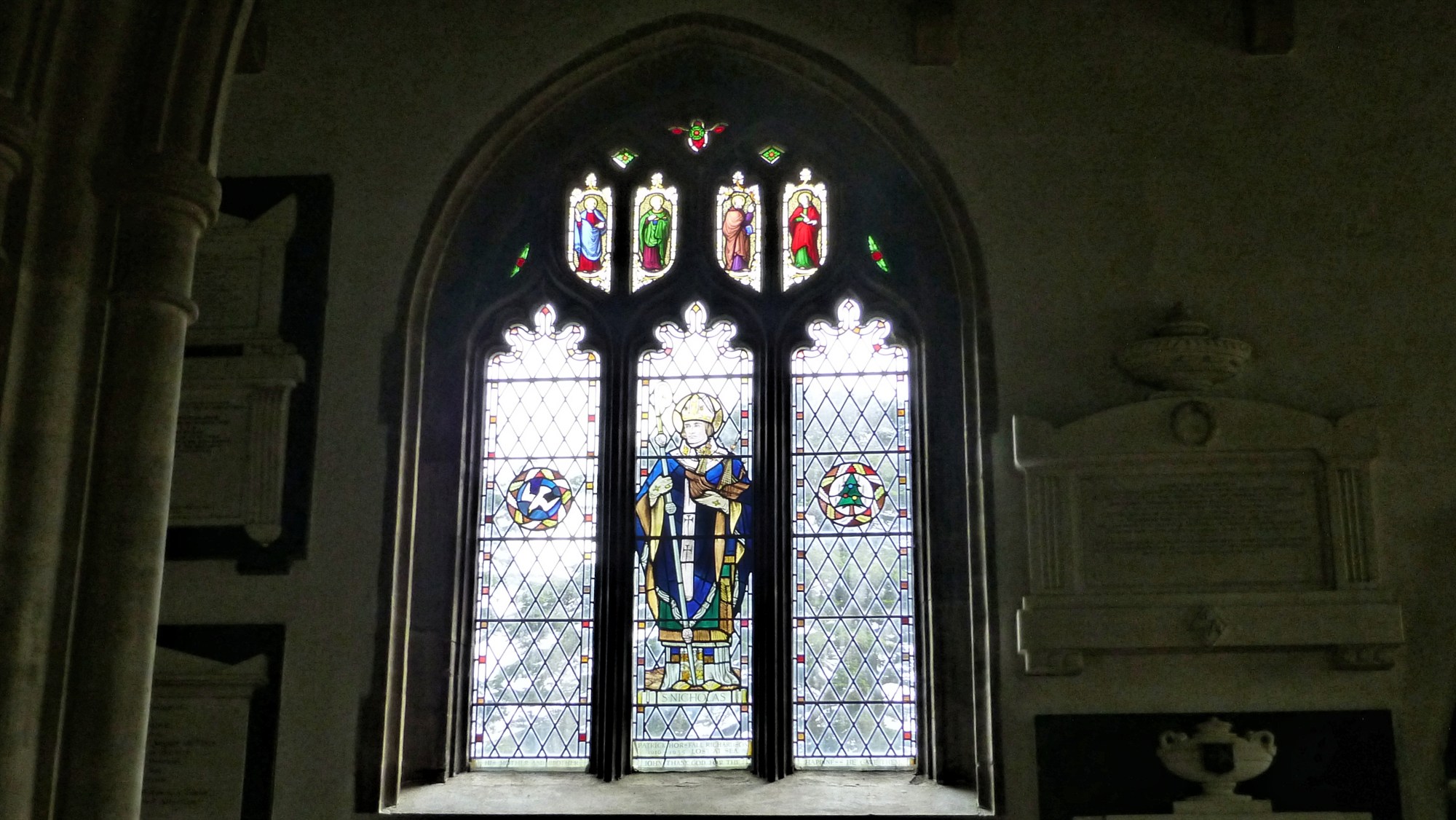 One of the stained glass windows in the Nave of the church