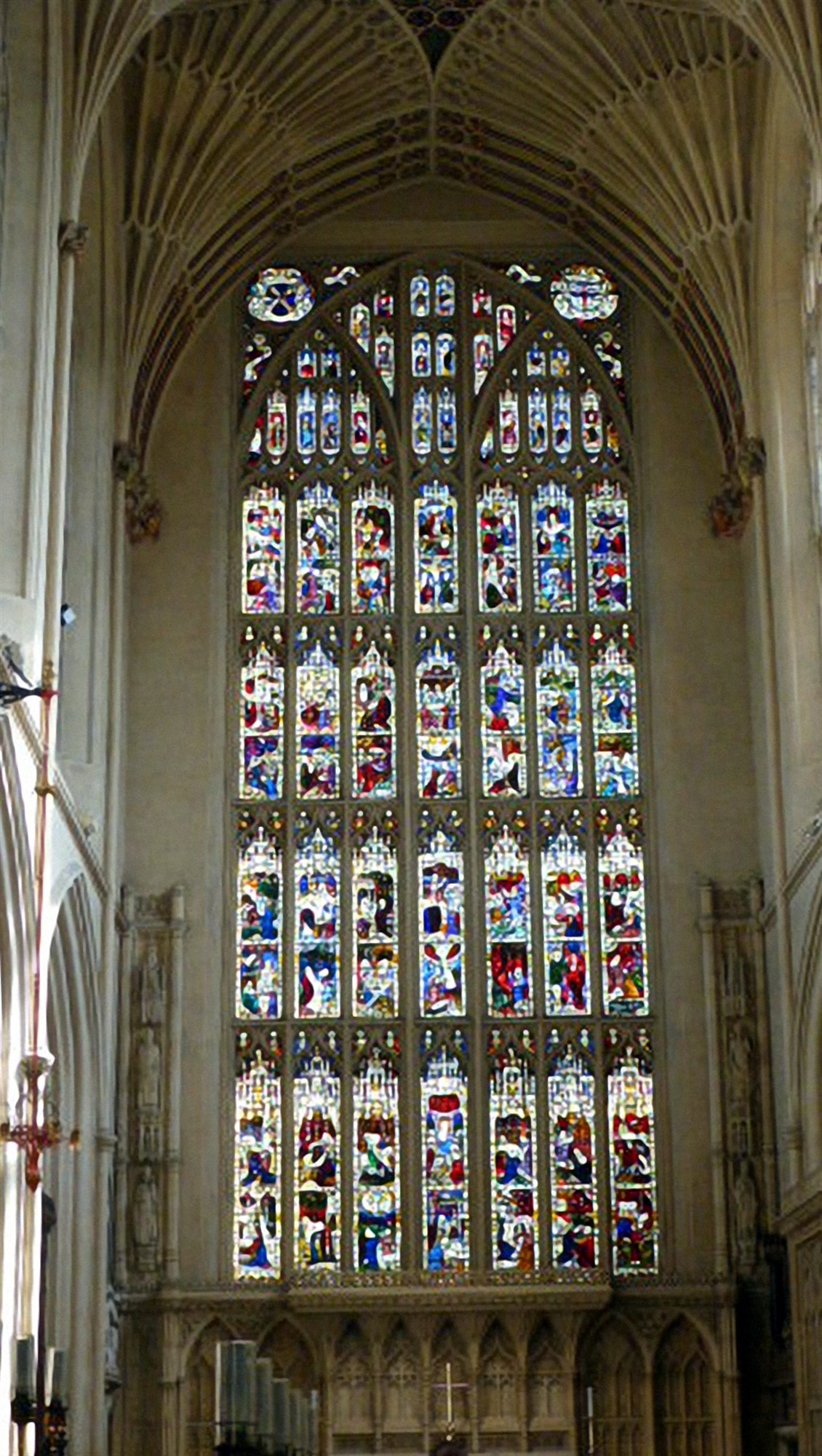 The magnificent stained glass window above the Alter