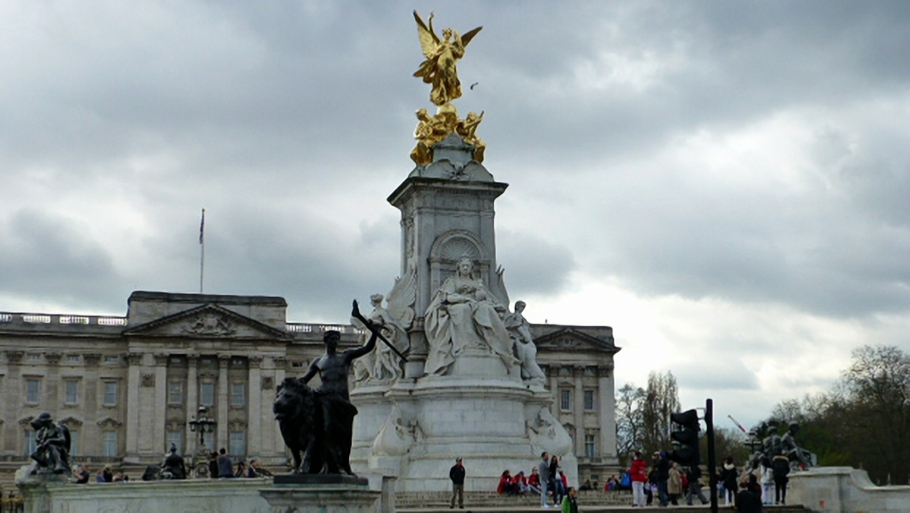 The Victoria Memorial greets tourists approaching Buckingham Palace from The Mall