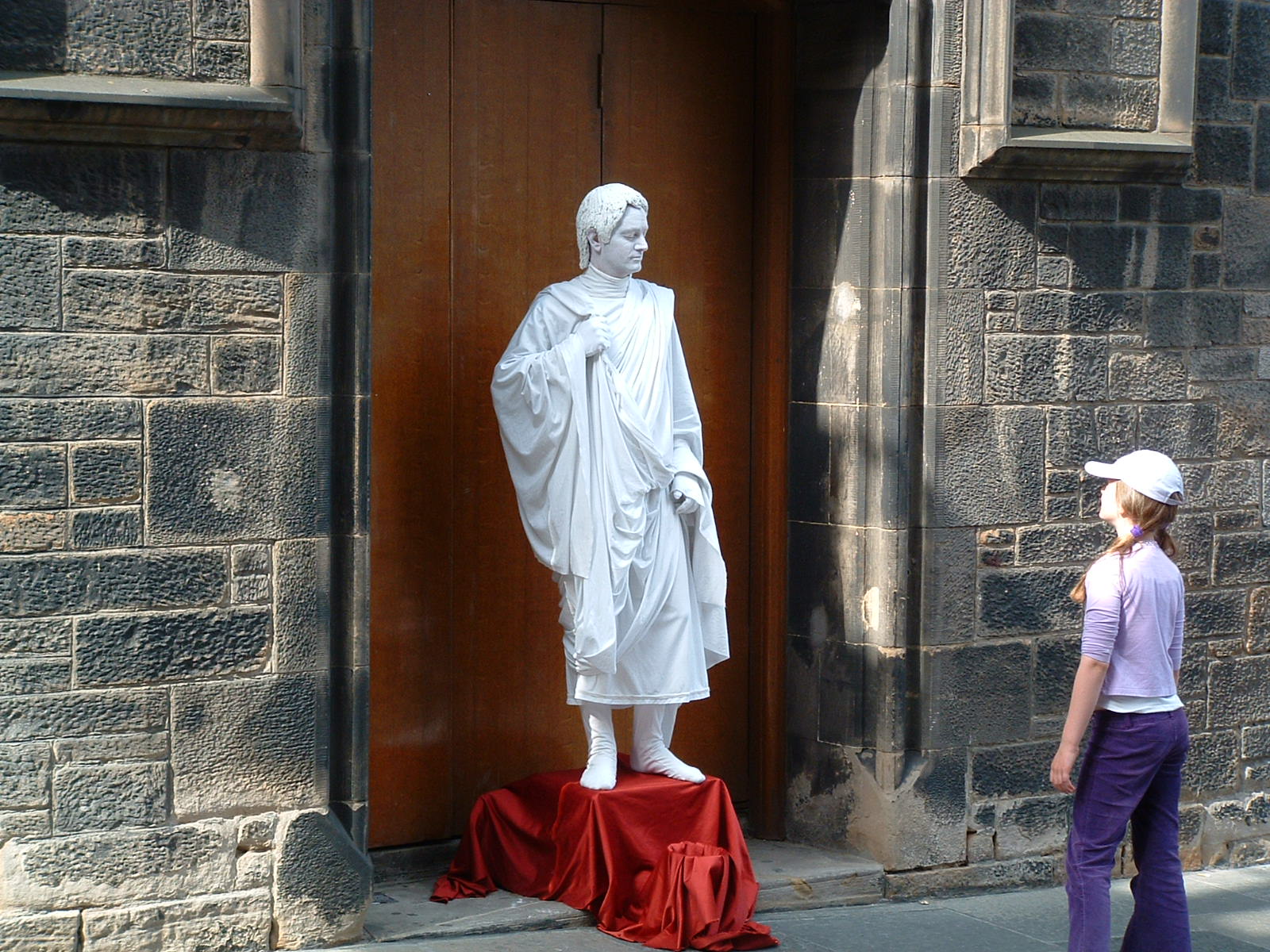 A young girl looking at a 'living statue' (one of my favorite picture)