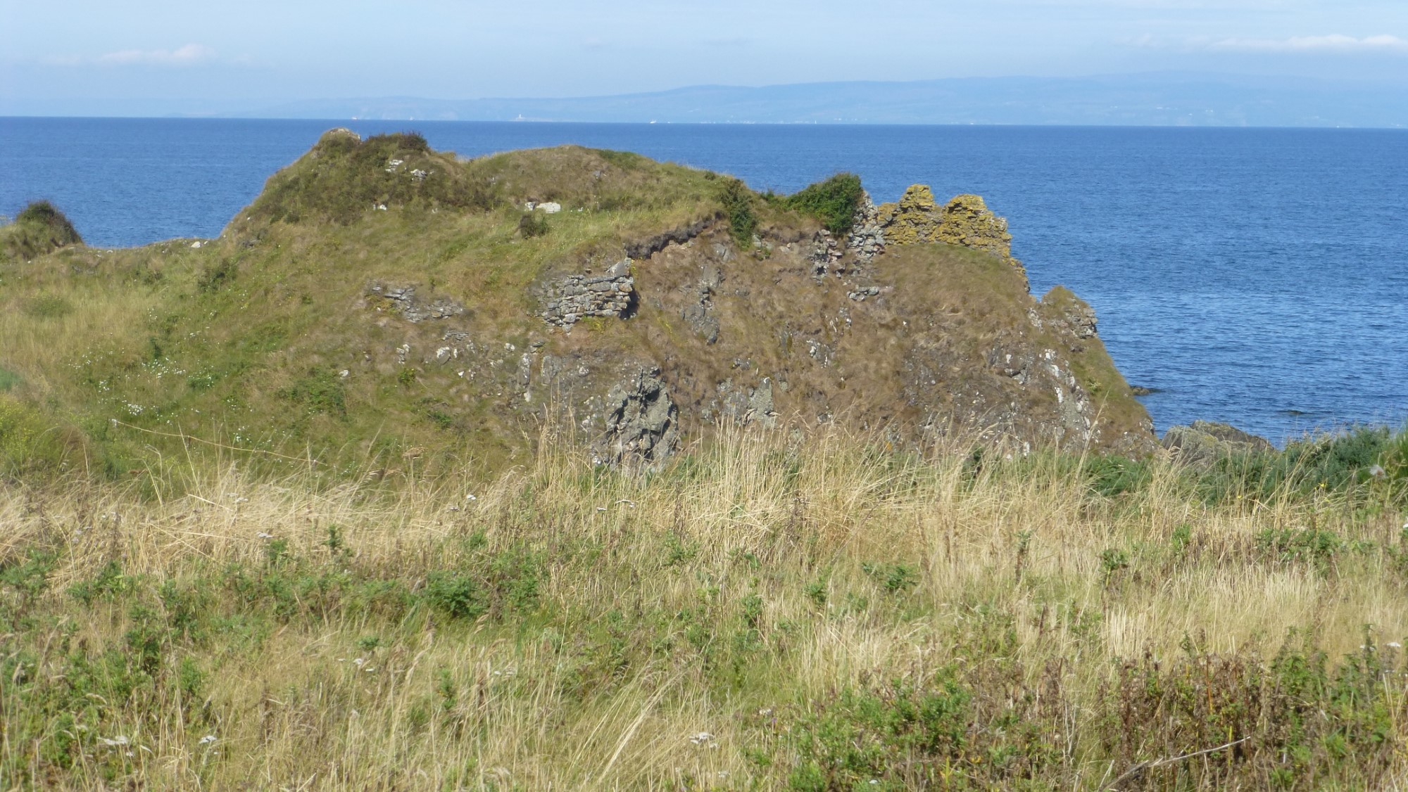 Turnberry Castle, supposed birthplace of Robert the Bruce, today is reduced to a pile of rocks on the coast of the Firth of Clyde. (2022)
